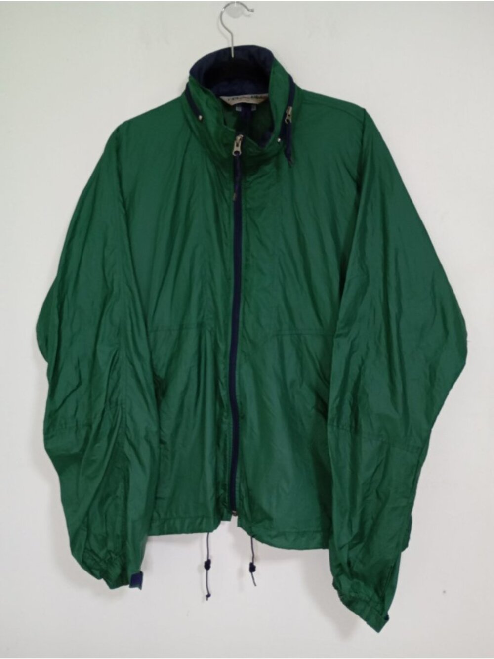 Eastern Mountain green windbreaker jacket, 100% nylon, detachable hood, size L.